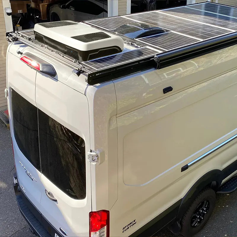 12v rv ac unit installed on the rooftop of a class b van